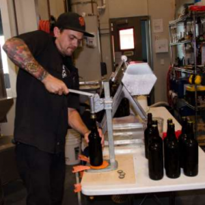 triple-voodoo-hand-bottling